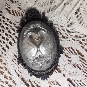 White Swans Cameo Brooch in Black Resin Frame